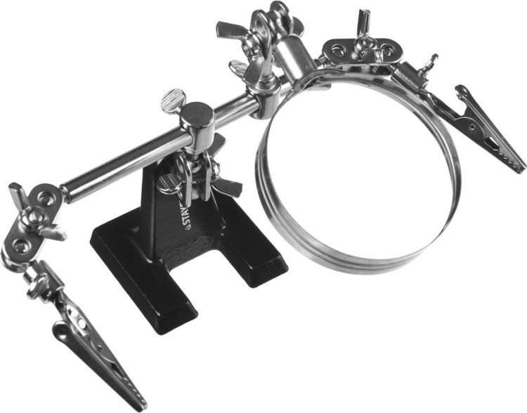 Штатив для фиксации электронных плат с увеличительной линзой STAYER 55339 освобождает руки и позволяет легко осуществлять паяльные работы на   электронной плате при помощи зажимов для крепления